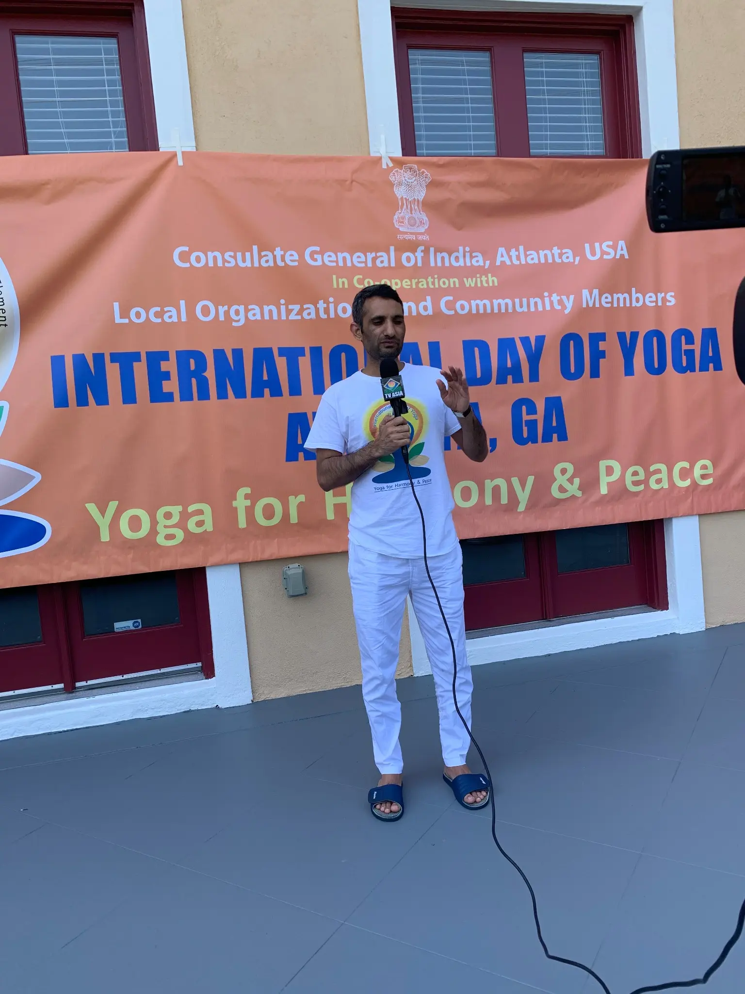Dr. Somveer Arya addressing an International Day of Yoga gathering